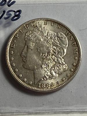 1886-P AU58 QUALITY MORGAN SILVER DOLLAR AS PICTURED COIN #7.