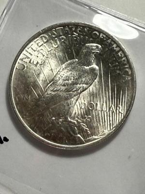 1923-P UNCIRCULATED CONDITION PEACE SILVER DOLLAR COIN #4 AS PICTURED.