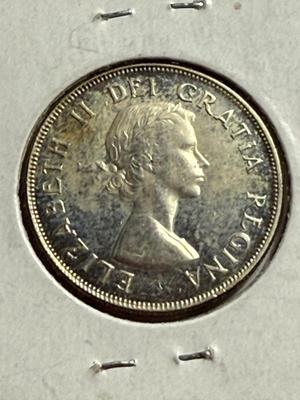 CANADA 1953 AU/UNCIRCULATED CONDITION CLEANED OBV 50-CENT SILVER COIN AS PICTURED.