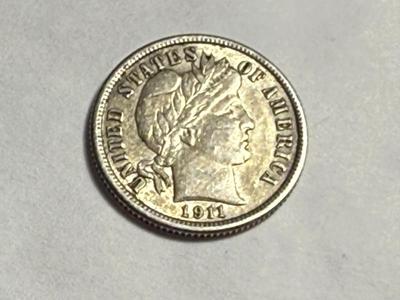 1911-P VF+ CONDITION CLEANED LIBERTY BARBER SILVER DIME AS PICTURED.