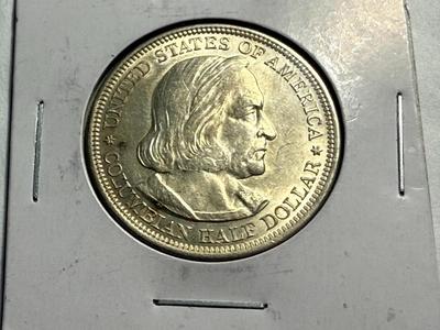 1892 AU COLUMBIAN EXPOSITION SILVER COMMEMORATIVE HALF DOLLAR AS PICTURED.