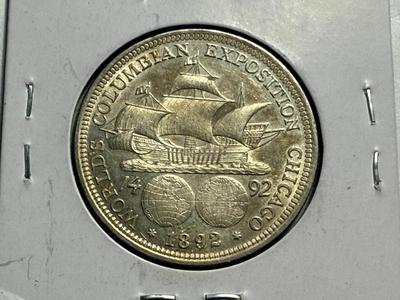 1892 AU COLUMBIAN EXPOSITION SILVER COMMEMORATIVE HALF DOLLAR AS PICTURED.