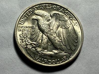 1947-P UNCIRCULATED CONDITION SILVER WALKING LIBERTY HALF DOLLAR AS PICTURED.