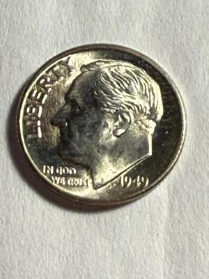 1949-D UNCIRCULATED/VERY LIGHTLY TONED ROOSEVELT SILVER DIME AS PICTURED.