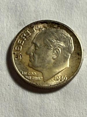 1946-D UNCIRCULATED/LIGHTLY TONED ROOSEVELT SILVER DIME AS PICTURED.