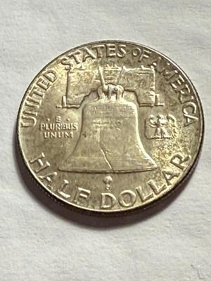 1949-P AU CONDITION TONED CONDITION SILVER FRANKLIN HALF DOLLAR AS PICTURED.