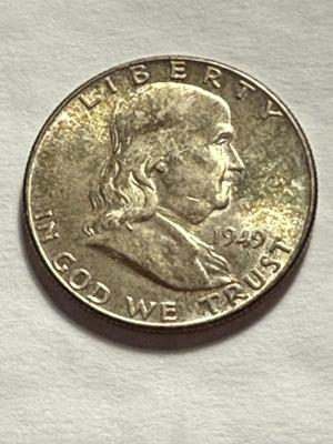 1949-P AU CONDITION TONED CONDITION SILVER FRANKLIN HALF DOLLAR AS PICTURED.