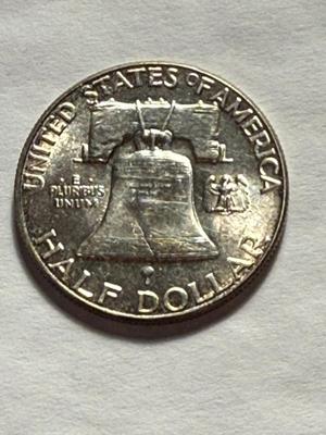 1953-P CHOICE AU/UNCIRCULATED TONED CONDITION SILVER FRANKLIN HALF DOLLAR AS PICTURED.