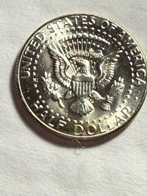 1970-D CHOICE BU CONDITION SILVER KENNEDY HALF DOLLAR AS PICTURED.