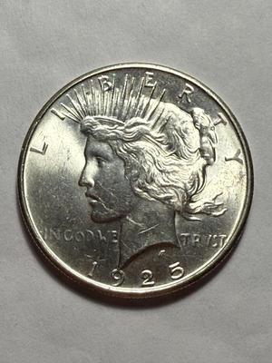 1925-P UNCIRCULATED CONDITION PEACE SILVER DOLLAR AS PICTURED. $5 DOMESTIC SHIPPING.