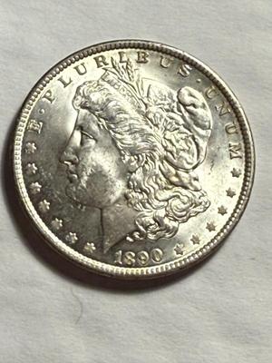 1890-P UNCIRCULATED CONDITION MORGAN SILVER DOLLAR.