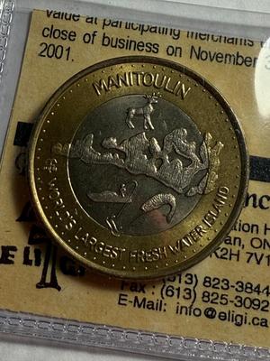 CANADA MANITOULIN 2001 BI-METALLIC $3 TOKEN MINTAGE-3750 AS PICTURED.