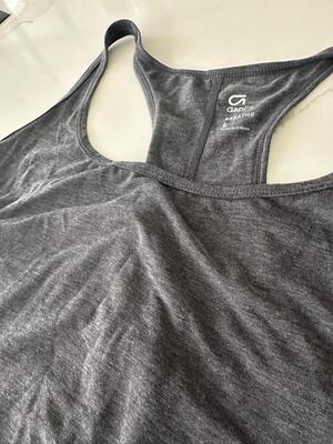 three Ladies athletic top with racerback. 2 are gap fit breathe and New one by Nike dry-fit