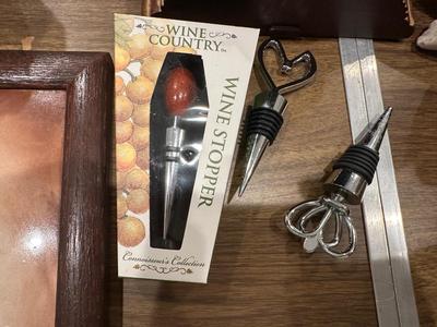 3 bottle Stopper one is brand new still in box