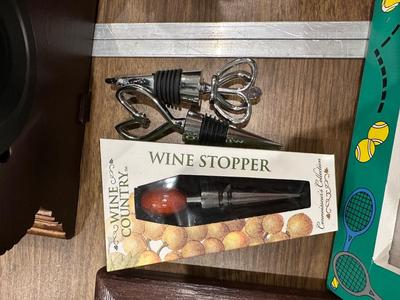 3 bottle Stopper one is brand new still in box