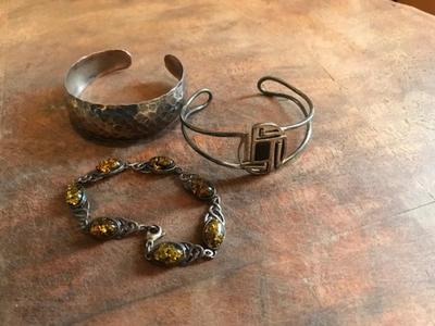 3 Bracelet lot including a sterling cuff and linked bracelet.