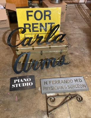 Building signs and vintage trunk