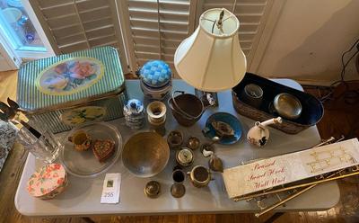Collection of incense burners, brass bowls, table lamp, tins and more.