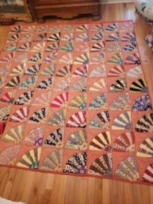 Vintage handmade grandmother's fan quilt