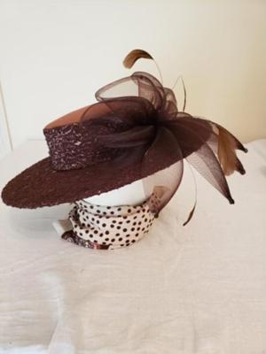 Women's brown felt wide brim hat with brown lace overlay, feathers & a brown net bow