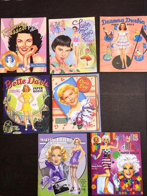 Lot of seven paper doll books