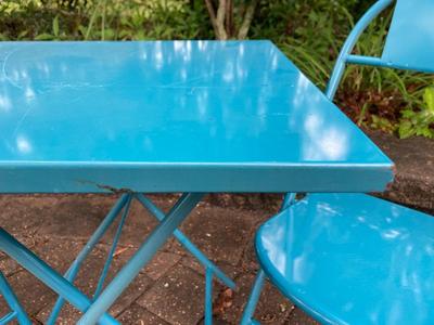 Childâ€™s vintage metal blue table and chairs