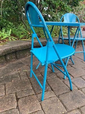 Childâ€™s vintage metal blue table and chairs