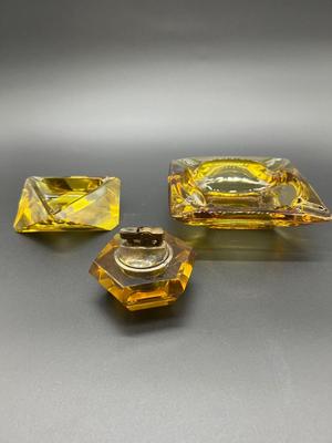 Vintage Amber Glass Lighter and Two Amber Ash Trays