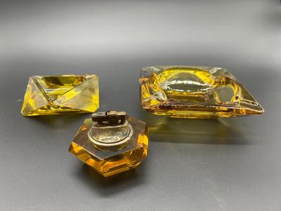 Vintage Amber Glass Lighter and Two Amber Ash Trays