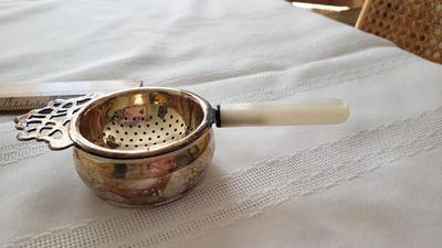 Antique Silverplate tea strainer made in England mother of pearl handle