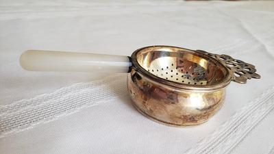 Antique Silverplate tea strainer made in England mother of pearl handle
