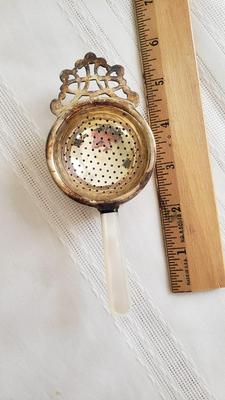 Antique Silverplate tea strainer made in England mother of pearl handle