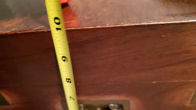 Brass and wood campaign chest on stand