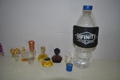 LOT 240. COLLECTION OF MINI  PERFUME BOTTLES
