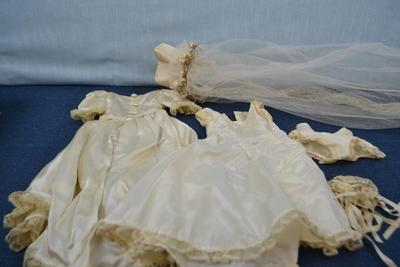 LOT 360. DOLL SIZE WEDDING DRESS AND VEIL
