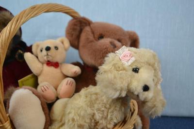 LOT 366. BASKET WITH FOUR BEARS