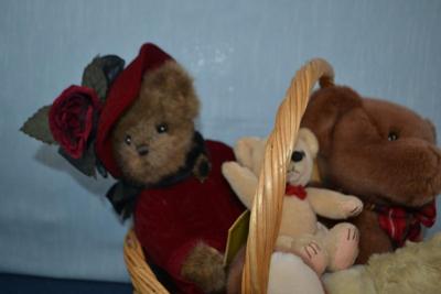 LOT 366. BASKET WITH FOUR BEARS