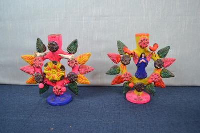 LOT 370. PAIR OF CLAY CANDLE HOLDERS