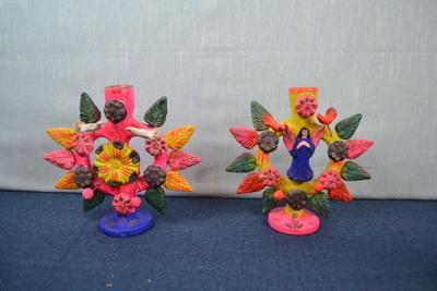 LOT 370. PAIR OF CLAY CANDLE HOLDERS