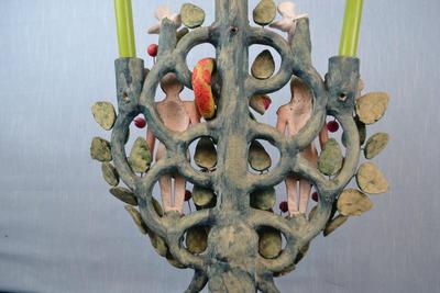 LOT 374. MEXICAN FOLK ART CLAY ADAM AND EVE CLAY STATUE/CANDLE HOLDER