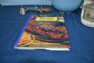 LOT 447. VINTAGE GILCHRIST ICE CREAM SCOOP, CROCK POT, CHOPPER, COOKWARE AND COOKBOOKS