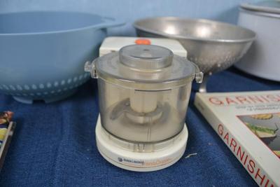 LOT 447. VINTAGE GILCHRIST ICE CREAM SCOOP, CROCK POT, CHOPPER, COOKWARE AND COOKBOOKS