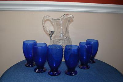 LOT 548 BLUE GLASSWARE WITH CRYSTAL PITCHER