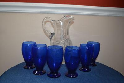LOT 548 BLUE GLASSWARE WITH CRYSTAL PITCHER
