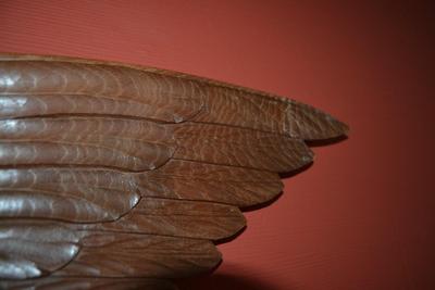 LOT 557. 31" CARVED WOOD EAGLE