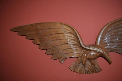 LOT 557. 31" CARVED WOOD EAGLE