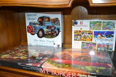 LOT 565. FOUR PUZZLES