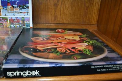 LOT 565. FOUR PUZZLES