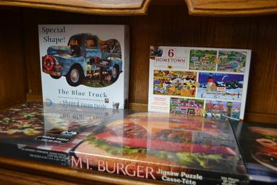 LOT 565. FOUR PUZZLES