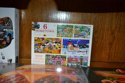 LOT 565. FOUR PUZZLES
